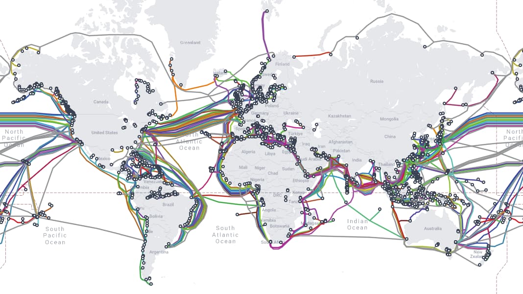 A world map with the landmasses in grey and coloured lines traversing the oceans connecting them all